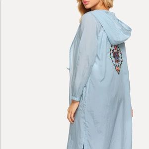 Flower embroidery hooded coat.